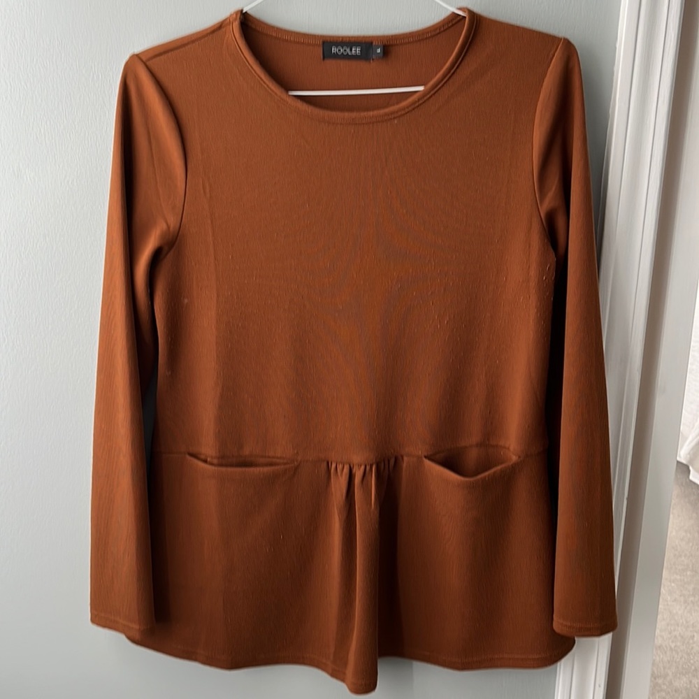 Long sleeve top with pockets